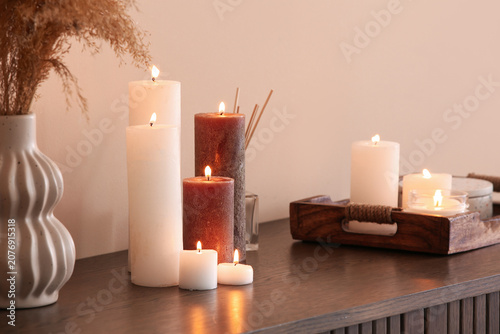 Different burning candles o...