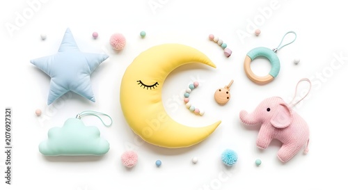 Sweet assortment of colorful baby items like plush moon, star, elephant, and rattles for a gentle nursery theme, arranged on a white background.