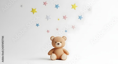 Cute brown teddy bear sitting on a white surface with colorful stars floating above it, against a clean white background, perfect for children's themes.
