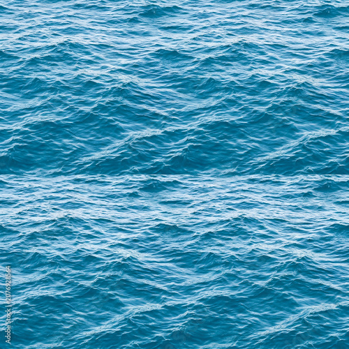 Azure Ocean Surface With Gentle Waves.