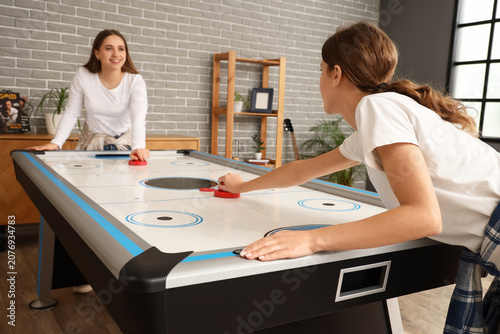 Young women playing air hoc...