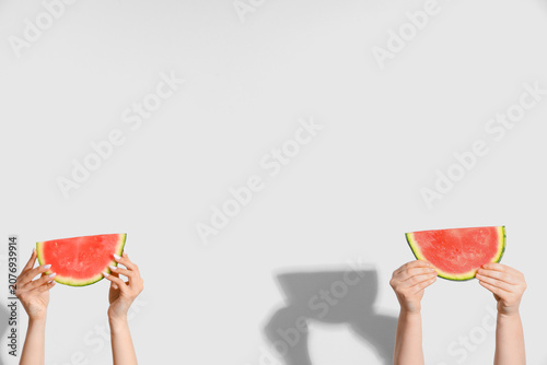 Female hands with pieces of...