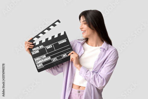 Young pretty woman with mov...