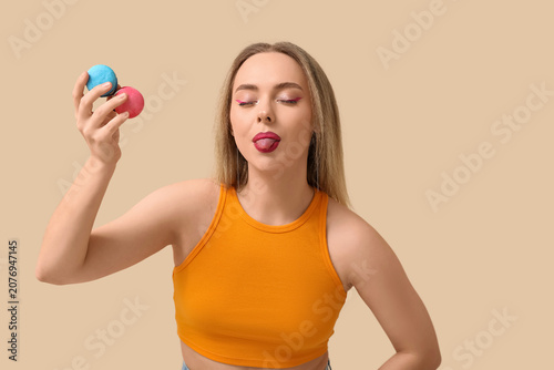 Funny young woman with swee...