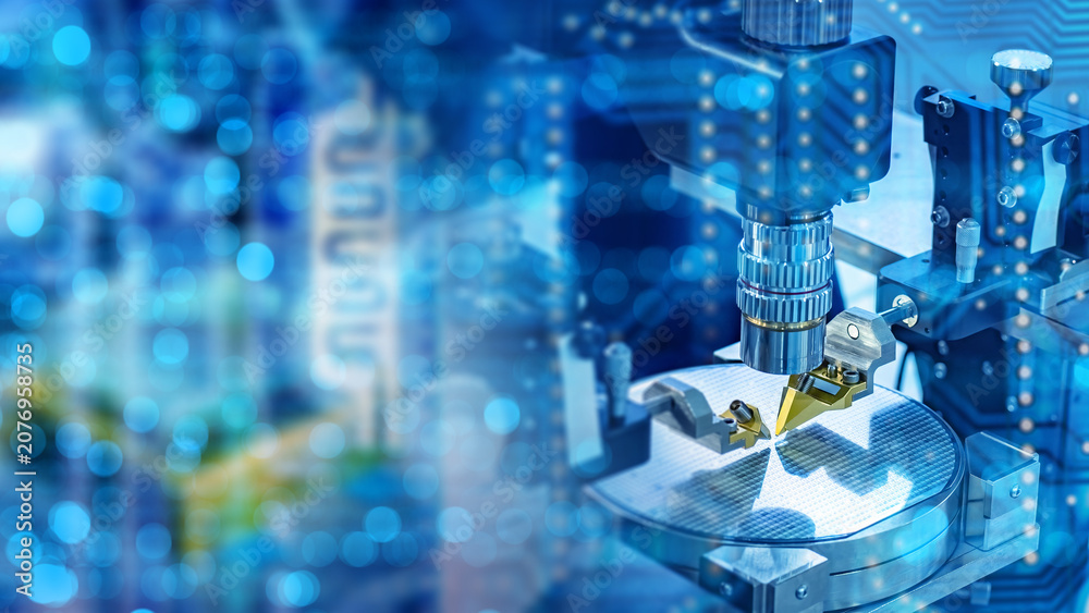 Obraz premium Semiconductor manufacturing engineer operates robotic precision tool inspecting silicon wafer in automated chip production facility with cleanroom technology