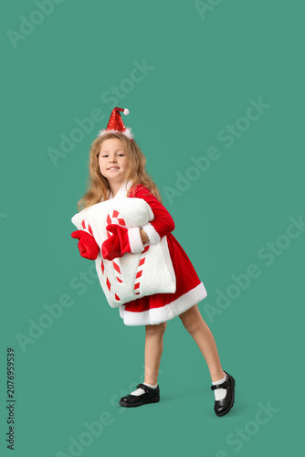 Cute little girl in Santa C...