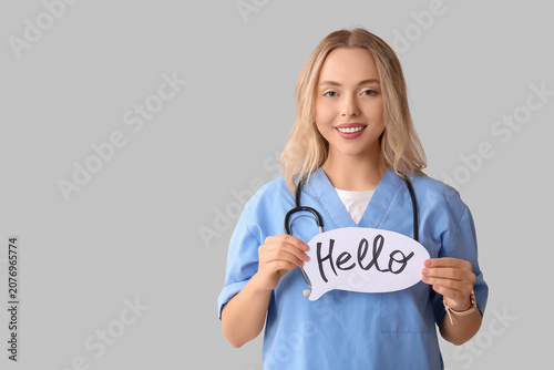 Beautiful female doctor hol...