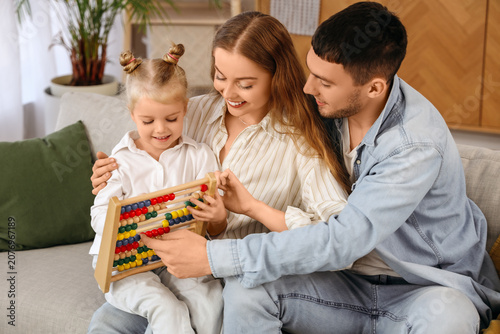 Happy parents and their lit...