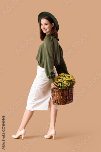 Young woman with chrysanthe...