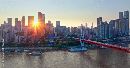 Aerial view of Chongqing skyline and Yangtze River bridge at sunset, China