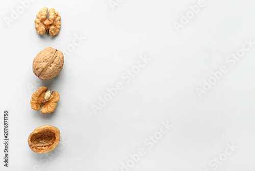 Tasty walnuts on white back...