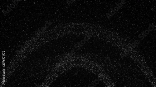Subtle golden-orange particles form soft concentric rings on a dark background, creating a mysterious cosmic pattern
