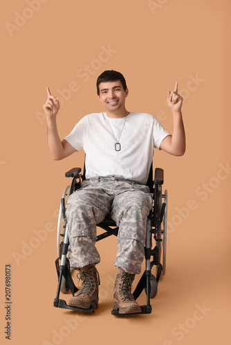 Young soldier in wheelchair...