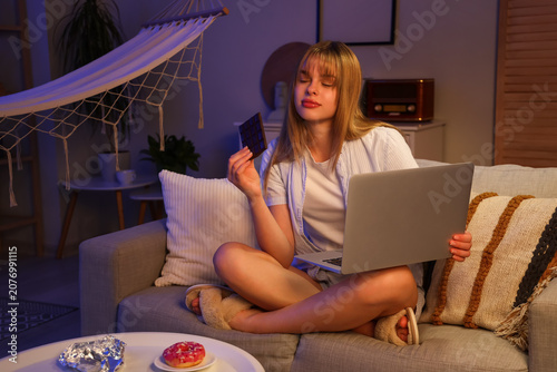 Young woman with tasty choc...