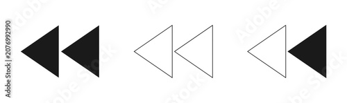 Photos A set of four black and white arrowhead shapes pointing left