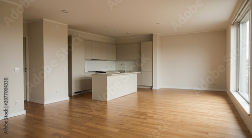 Modern interior with kitchen area and wooden floor against windows