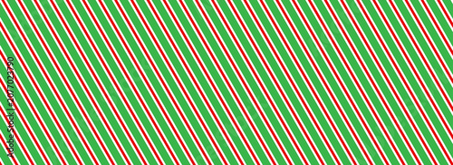 Christmas seamless pattern. Red and green diagonal stripes background. Candy cane repeating decoration wallpaper. Winter holiday lines backdrop. Xmas peppermint present wrapping.eps10 ilustration