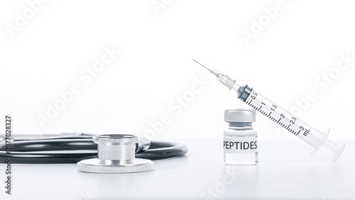 Photography Professional wellness clinic setup with peptide vial syringe and stethoscope off