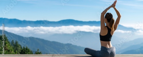 Yoga meditation woman in nature finding peace and serenity on a mountain at sunrise
