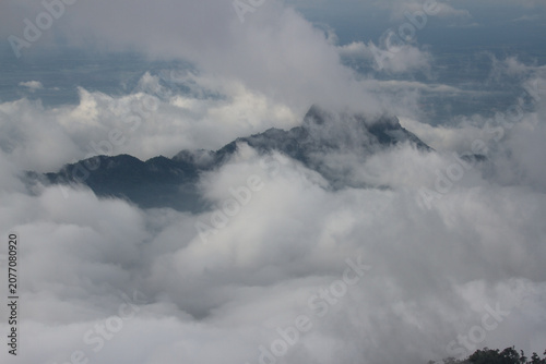 time lapse clouds over the mountains