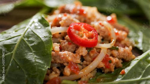 Macro Detail of Glossy Resin Minced Pork and Wax Holy Basil Leaves