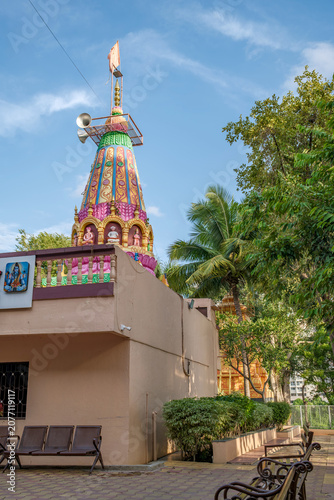 Εκτύπωση καμβά An exterior shot of a local Hindu temple in the suburban neighbourhood of Kharadi, showcasing traditional Indian temple architecture, intricate carvings and devotional details