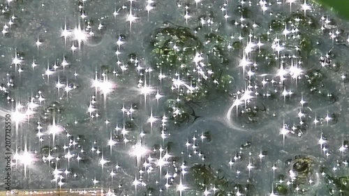 Abstract Midday Sun Sparkles on Water Surface, Shiny Diamond Glitter Texture in Muddy Pond 
4k


