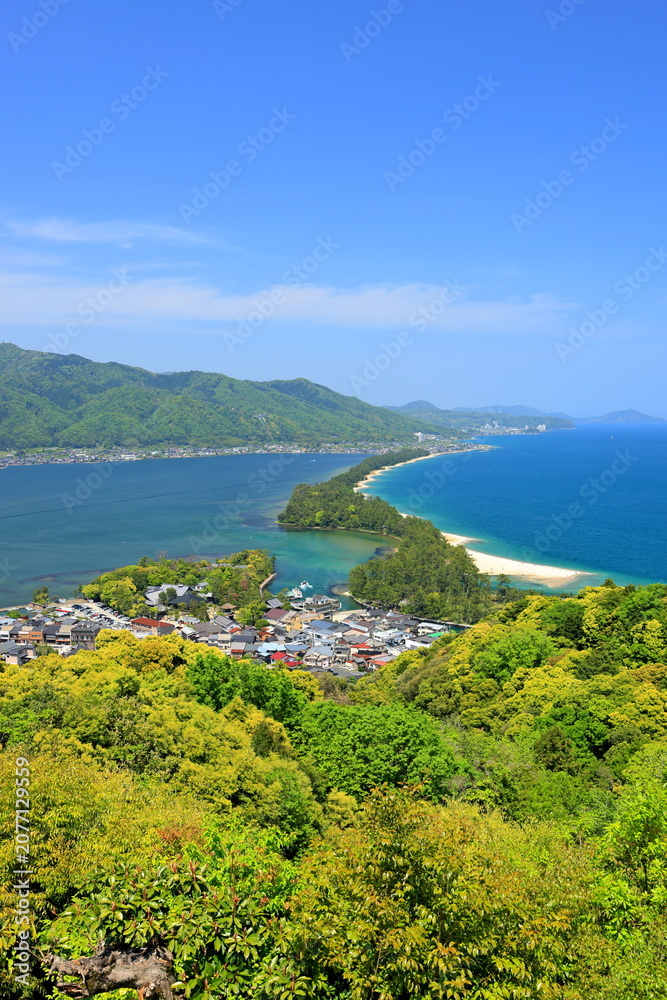 Fototapeta premium Amanohashidate, a 3.6 kilometer sandbar, known for its beaches and thousands of pine trees in Monju, Miyazu, Kyoto, Japan