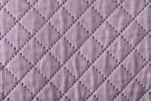 Light quilt bedcover with relief Narrow focus line, shallow depth of field