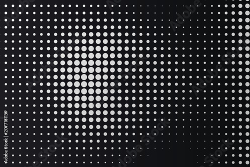 High-contrast black-and-white halftone dot pattern on dark background, dots blackandwhite monochrome