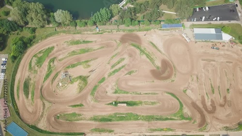 High angle drone over winding dirt track