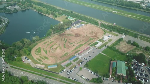 High orbit drone above track and urban area