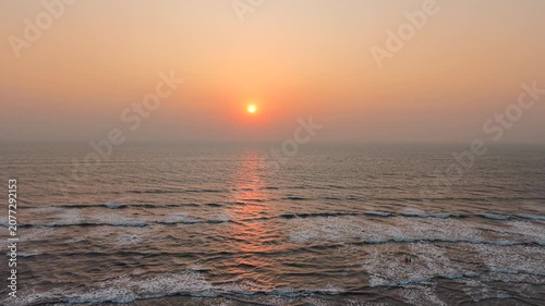 Beautiful Sunrise Over the Ocean with Gentle Waves | Cinematic Aerial Drone Shot
