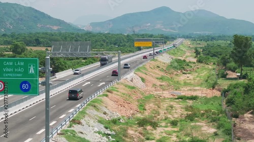 Aerial Drone View of Cam Lam Vinh Hao Expressway Through Mountain Landscape in Vietnam