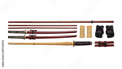 Japanese sword and accessories laid out.