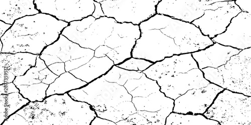 Photos grunge High-Contrast Cracked Dry Earth Texture Background Showing Drought Fissures and Arid Soil Pattern