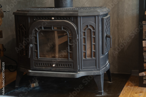 Vintage Cast Iron Wood Burning Stove in Indoor Setting