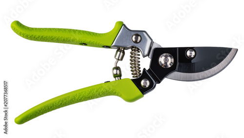 Fotografie Green handled pruning shears with metal blades and spring