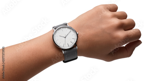 Fotografie Minimalist wristwatch with white face and grey fabric strap on a person s wrist
