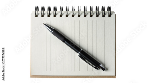 Quadro su tela Black ballpoint pen resting on a spiral-bound lined notebook