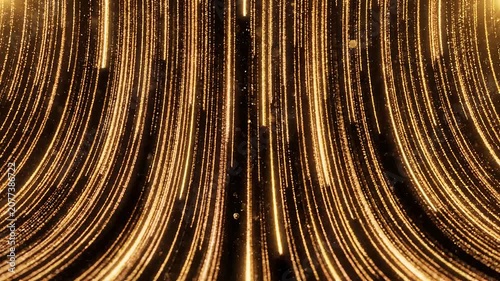 Golden light trails falling in a symmetrical curved motion