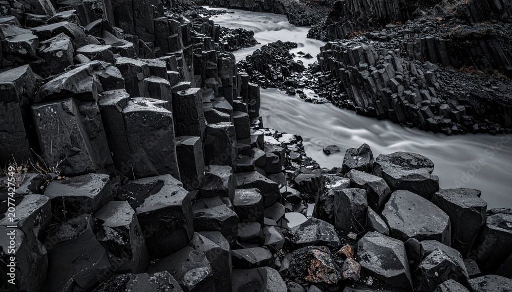 Fototapeta premium Dramatic Black Basalt Columns and River in Iceland Landscape