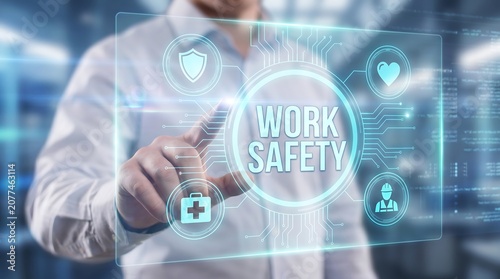 Business professional pointing at digital work safety holographic interface with protective and health icons in a high tech office environment for occupational hazard management