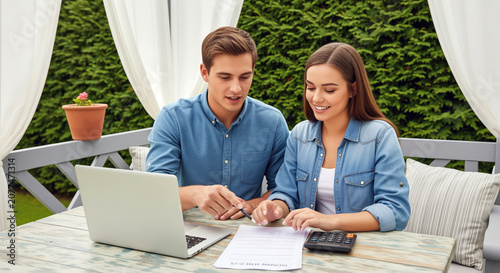 Household energy bills calculation or domestic property insurance policy renewal analysis to reduce monthly family expenses and manage shared checking account balances via online banking tools