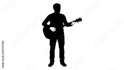Cuadro en lienzo Musician silhouette plays an acoustic guitar while standing isolated against a white background