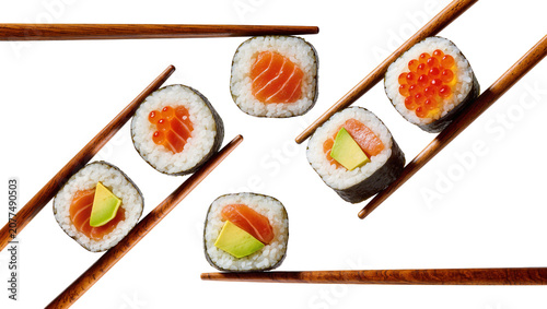 Fotografía Salmon Avocado and Ikura Sushi Rolls with Chopsticks