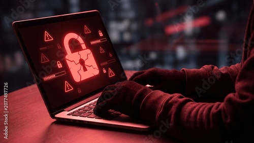 Cyber attack and data breach concept showing hands typing on a laptop screen with a glowing red broken padlock and multiple warning alert icons in a dark shadowy room