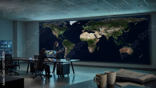 Modern command center with large digital world map for global data analysis