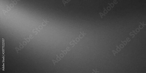 Fotografía Spotlight beam cutting through a dark, textured background, creating dramatic contrast and a sense of mystery