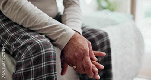 Close-up of a senior adult holding a painful hand due to arthritis, joint inflammation, or chronic hand pain. Concept of aging, musculoskeletal disorders, healthcare, pain management, elderly wellness